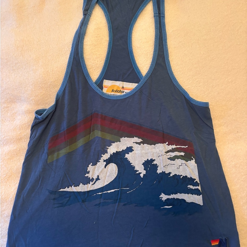 Aviator Nation Blue Tank with Rainbow Stripe and White Wave Graphic